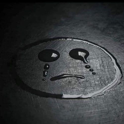 A powerful image of a person with a fierce expression, furrowed brows, and intense energy, symbolizing raw emotions and strength.