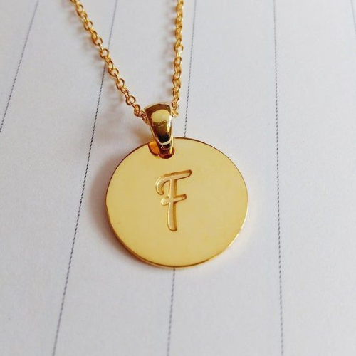 f on gold pendent