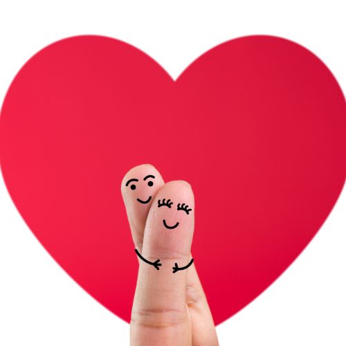 Two fingers with drawn happy faces hugging each other, set against a large red heart, symbolizing love and intimacy.
