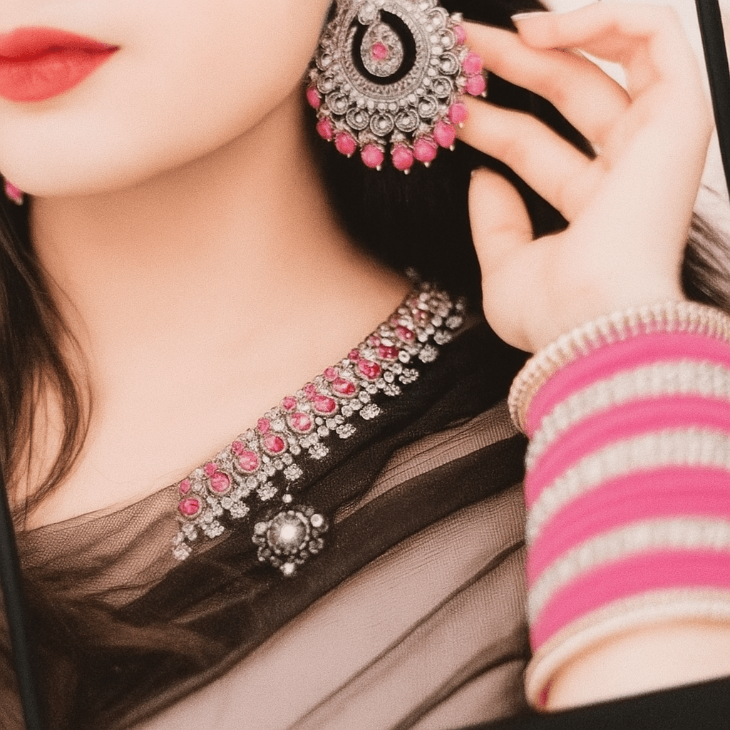 A woman adorned in elegant pink and black jewelry-