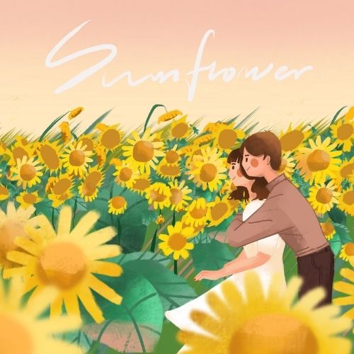 A couple embraces in a vibrant field of sunflowers, surrounded by bright yellow blooms under a clear blue sky