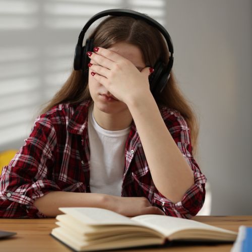 A girl wearing headphones