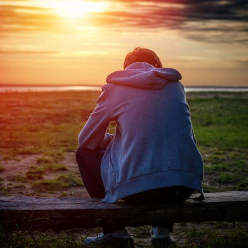 A person sitting on a bench