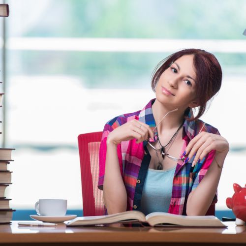 A woman seated at a desk