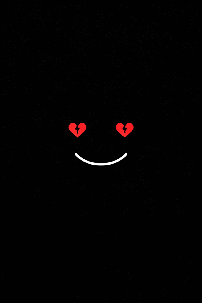 A black background featuring a cheerful smiley face surrounded by red hearts